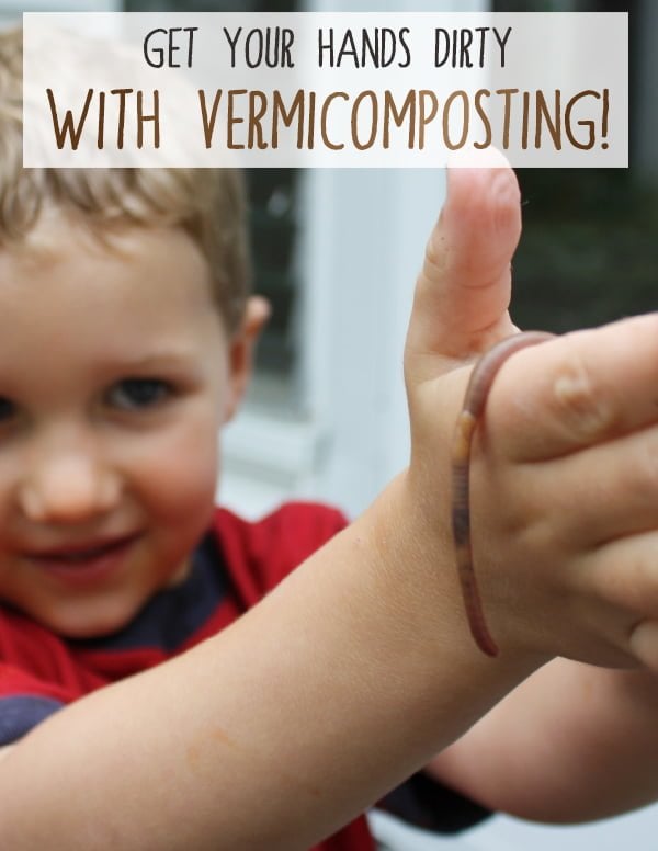 Boy with worms over his hand. Composting with worms and how to do vermicomposting