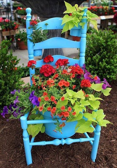 Recycled chair flower pot