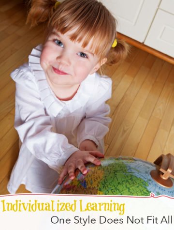 Homeschooled girl pointing to globe