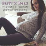 Pregnant woman reading to baby in womb