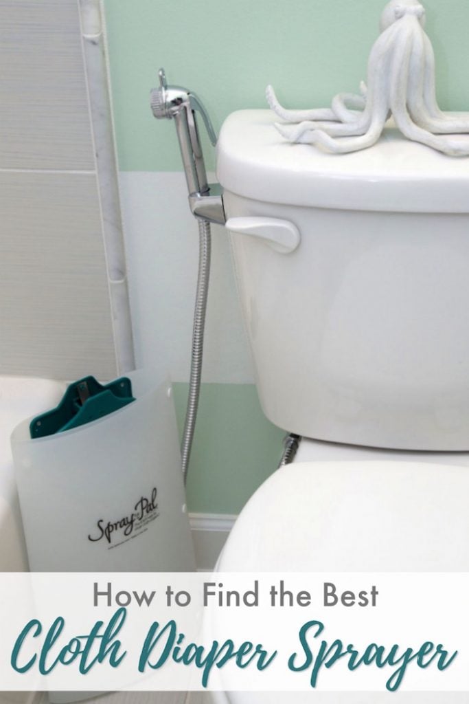 Bathroom toilet with diaper sprayer attached and splatter shield