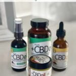 CBDPlus Oil products on bathroom counter