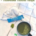 Tea mug, spoon, matcha green tea powder, and collagen peptides on marble kitchen counter