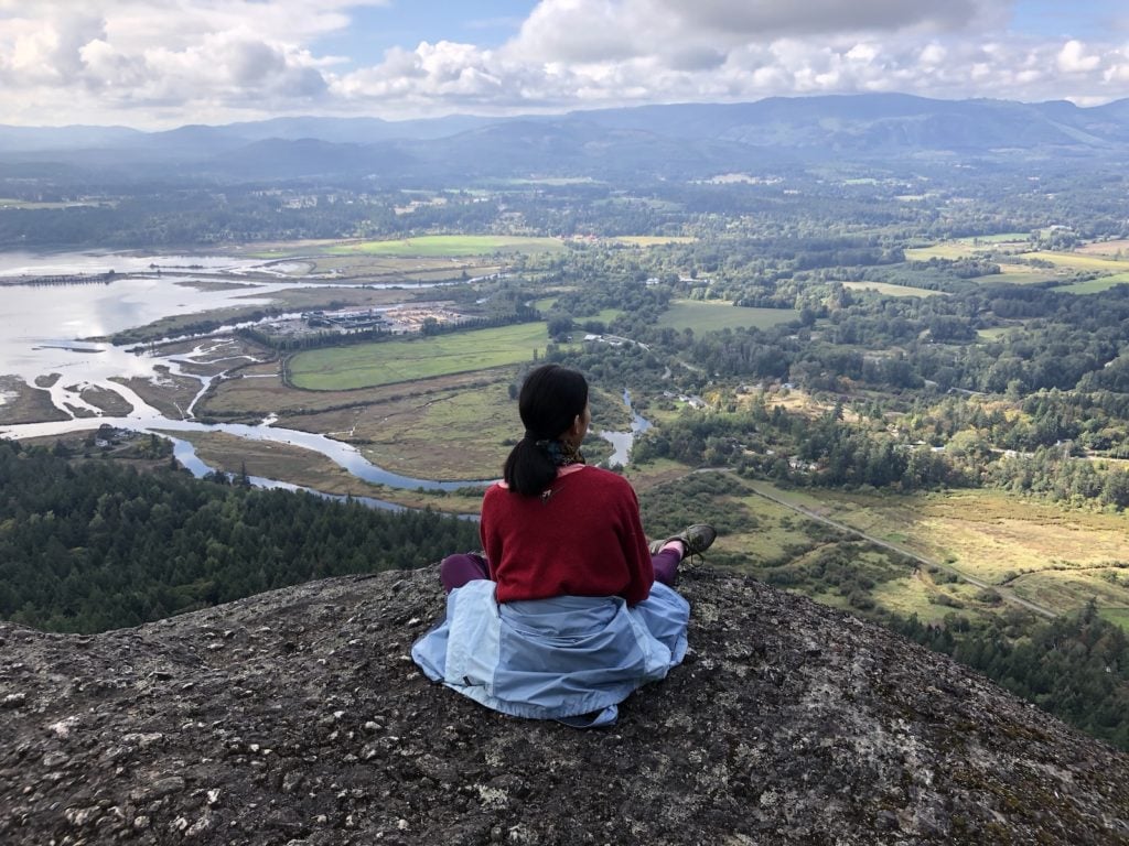 Homeschool girl on a hillside