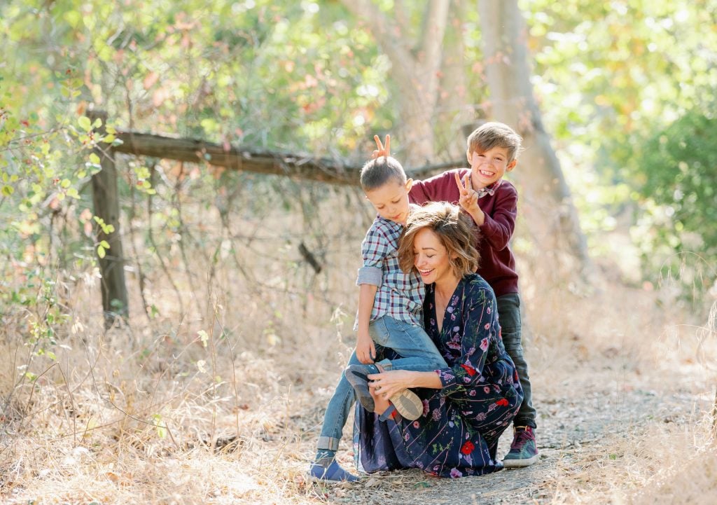 Autumn Reeser with her sons outside. Photography by Pau Von Rieter.