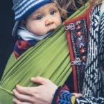 Mom babywearing in cold weather