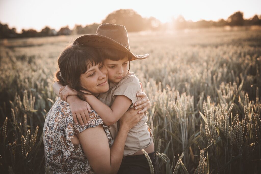 mom encouraging child in nature