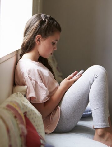 child texting nature deficit disorder
