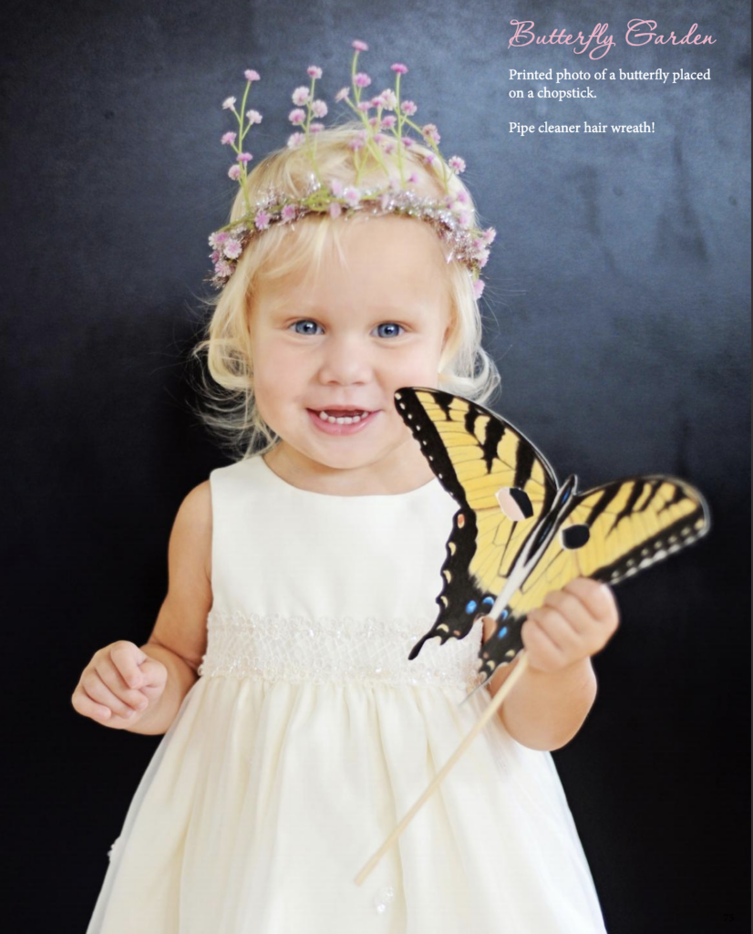 toddler in nature costume butterfly themed