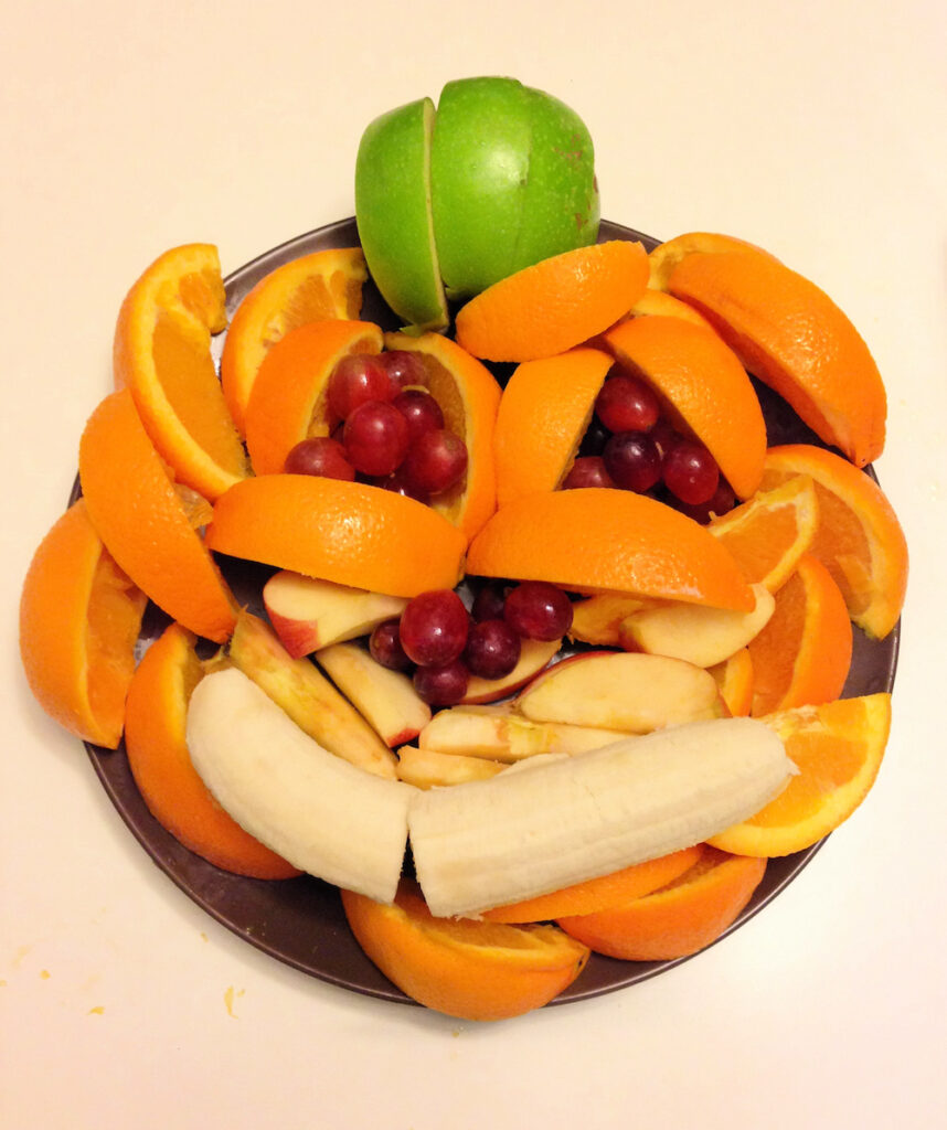 pumpkin fruit and veggie tray made by kids