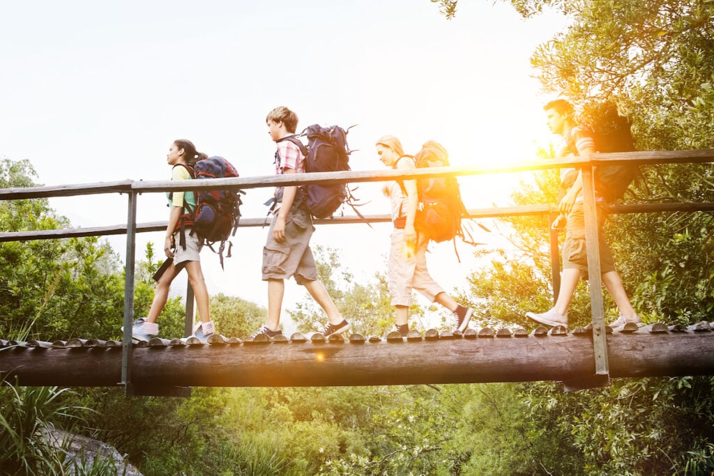 teens camping and hiking