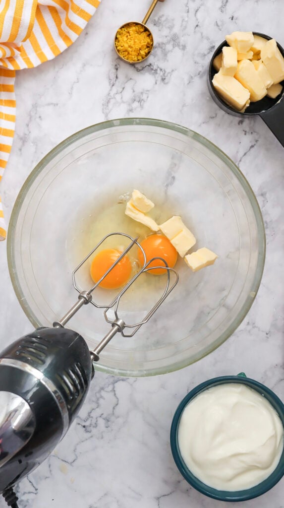 mixing butter and eggs for bundt cake